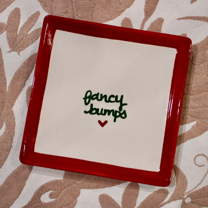 Hand-painted "fancy bumps” Caviar Plates/Collection of Four